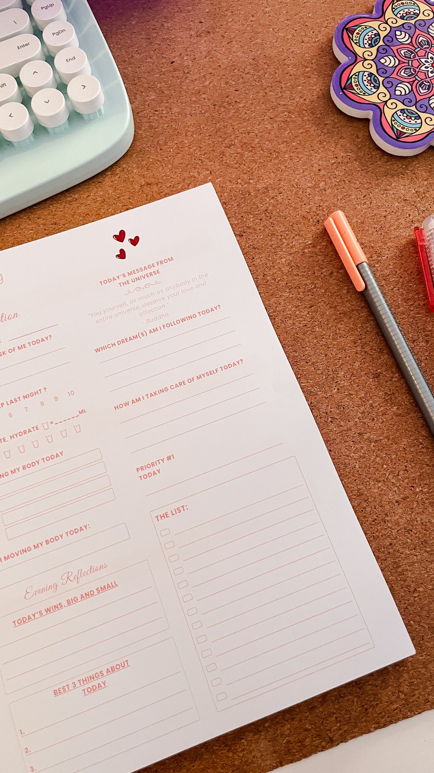 Notebook with printed text on a desk with stationery items